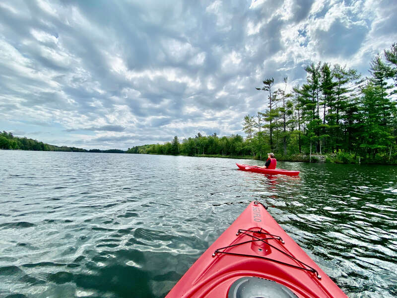 Couple kayaking on Long Lake in the heart of the Rideau Lakes